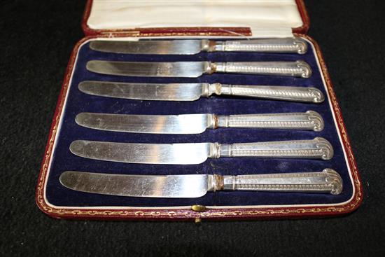 Silver toast rack and 6 silver handled tea knives